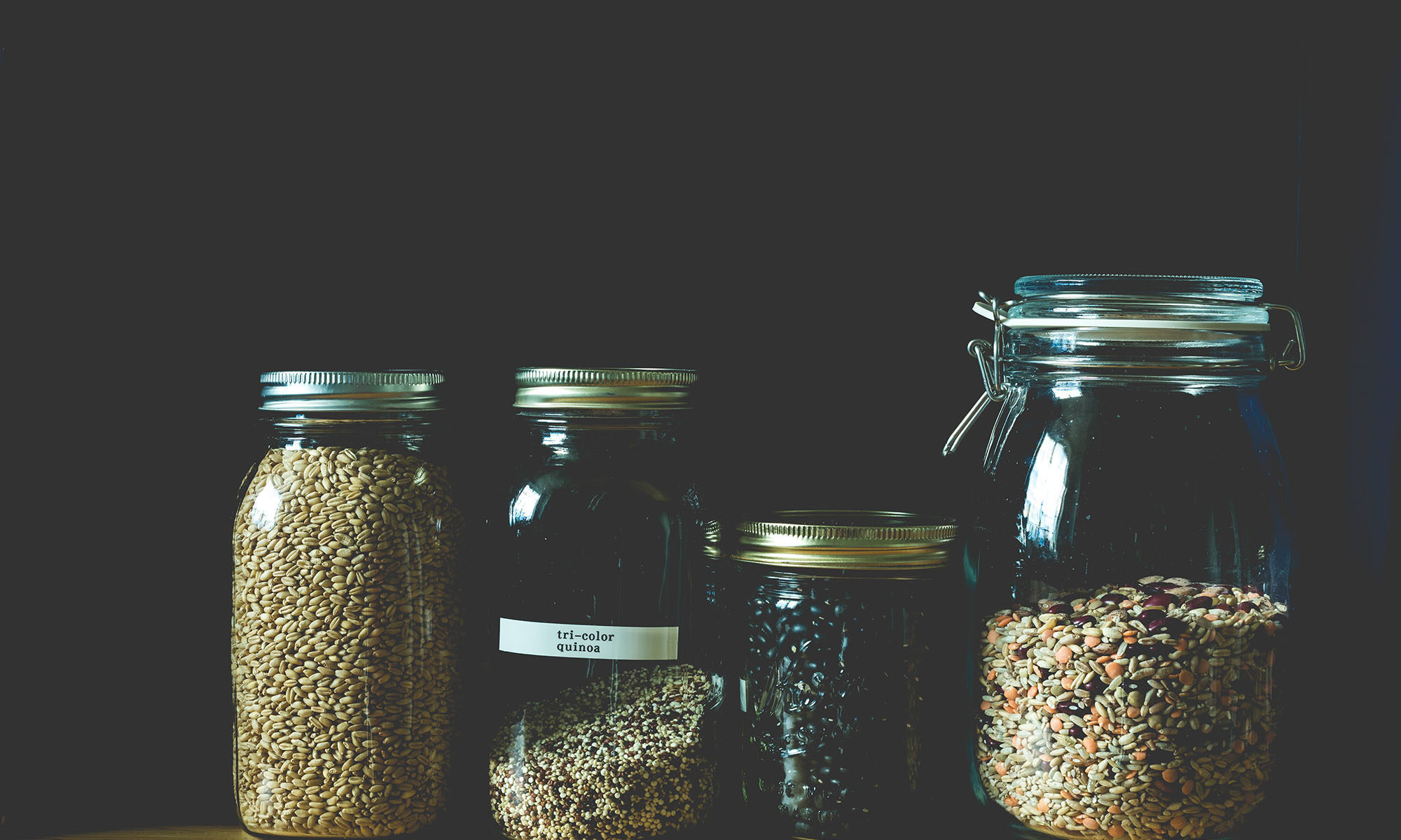 Photo of quinoa in mason jars.